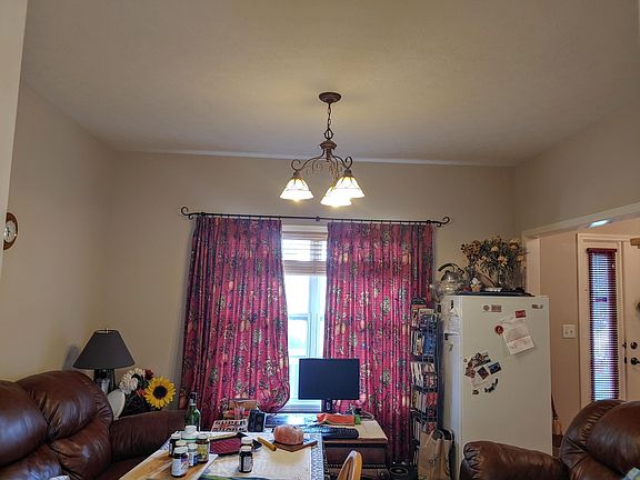 Gorgeous little den overlooking the backyard verandah, charming chandelier