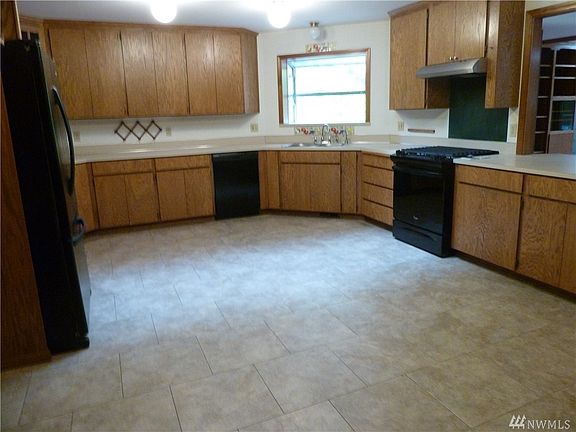 How's this for a deck? Enjoy to tree cover and the creek view.