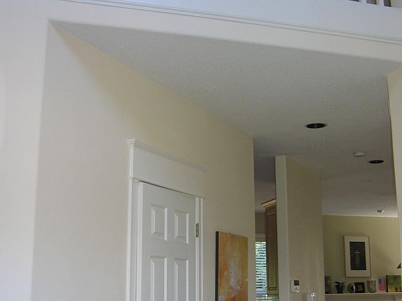 View when walking into the home from the front door looking up to upstairs.