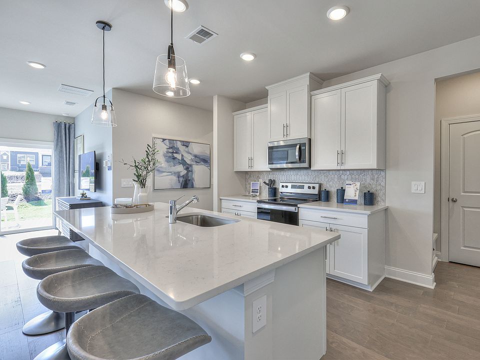 Prep dinner in the kitchen without missing the conversation in the great room.