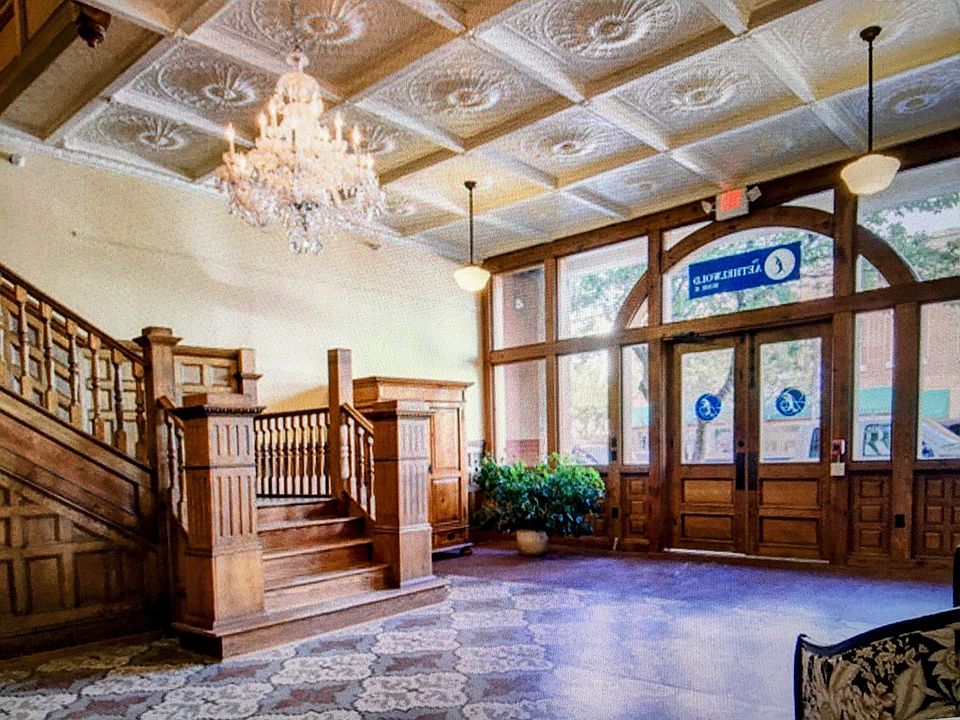 Entry into historic lobby and stairway to second floor