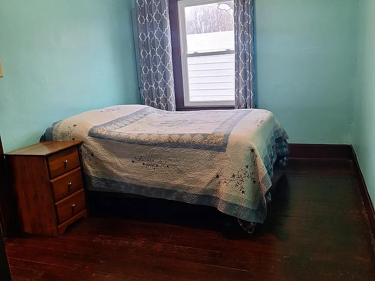 Downstairs bedroom with closet