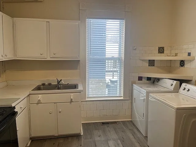 stove refrigerator washer dryer in kitchen all new vinyl flooring Beautiful Historic Home