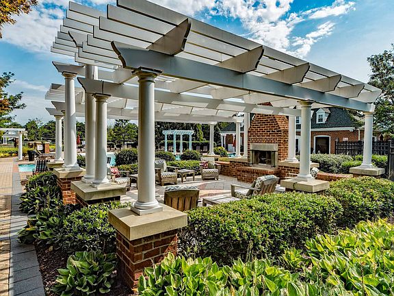 Gather around the outdoor hearth at our resort-style pool