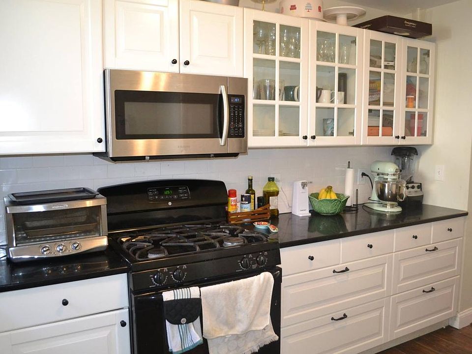 Kitchen. Gas stove, glass french door cabinets, very large d