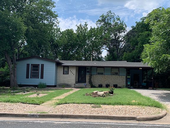 Current photo front yard. New landscaping and driveway