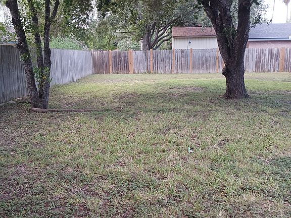 rear fenced lawn