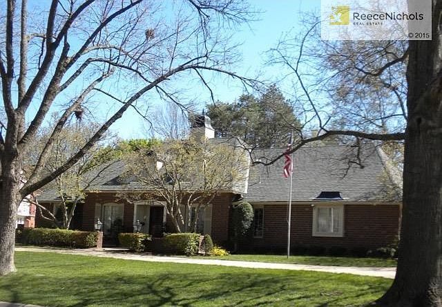 Coveted Leawood Estates - 3515 W. 100th St - stately home with circle drive and 3 car garage