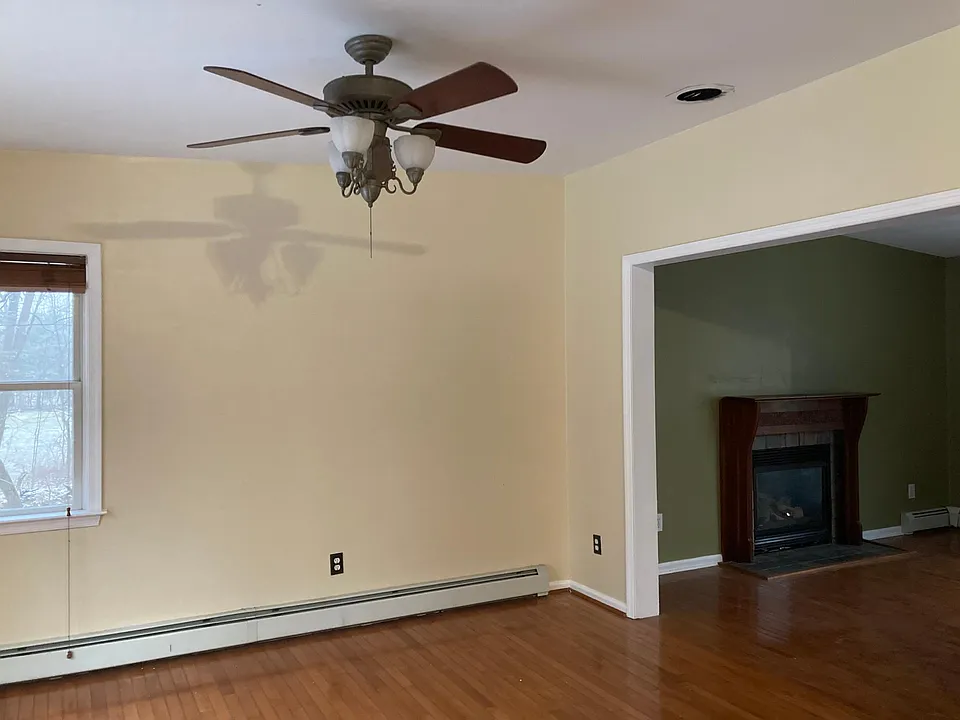 Dining room entry to living room with propane fireplace