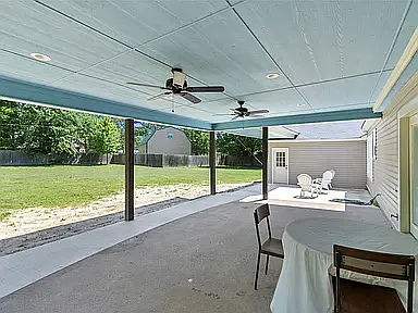 Covered Back porch, view of large backyard