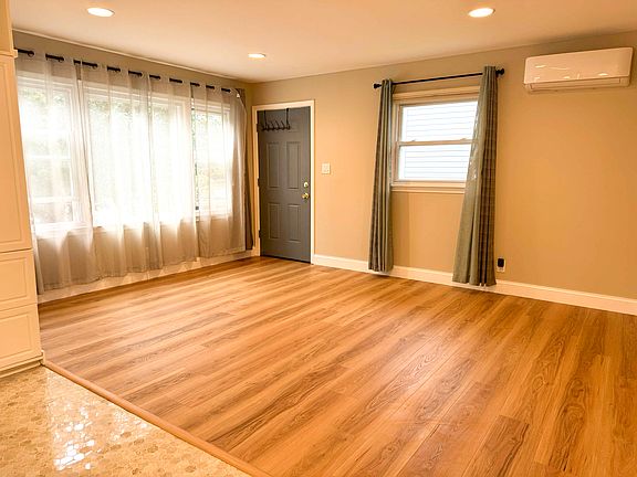 Upstairs living room, door to side porch