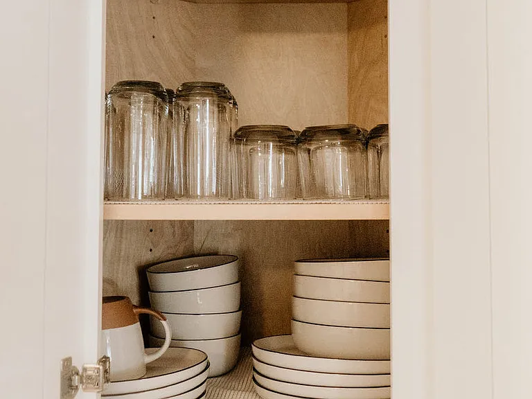 Enjoy hassle-free meals with a fully stocked kitchen, complete with plenty of dishes, cups, and bowls for your convenience