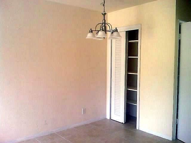 dining area and closet with shelving