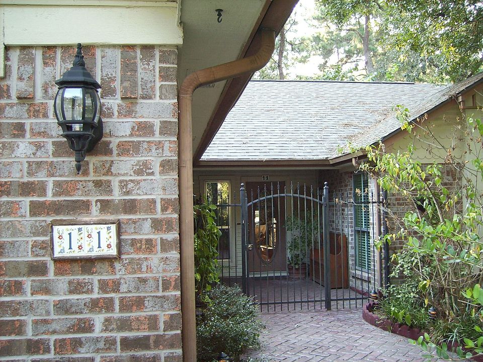Front of House with red brick path