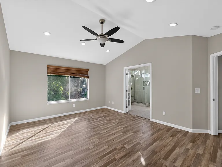 Primary Bedroom with tall ceiling