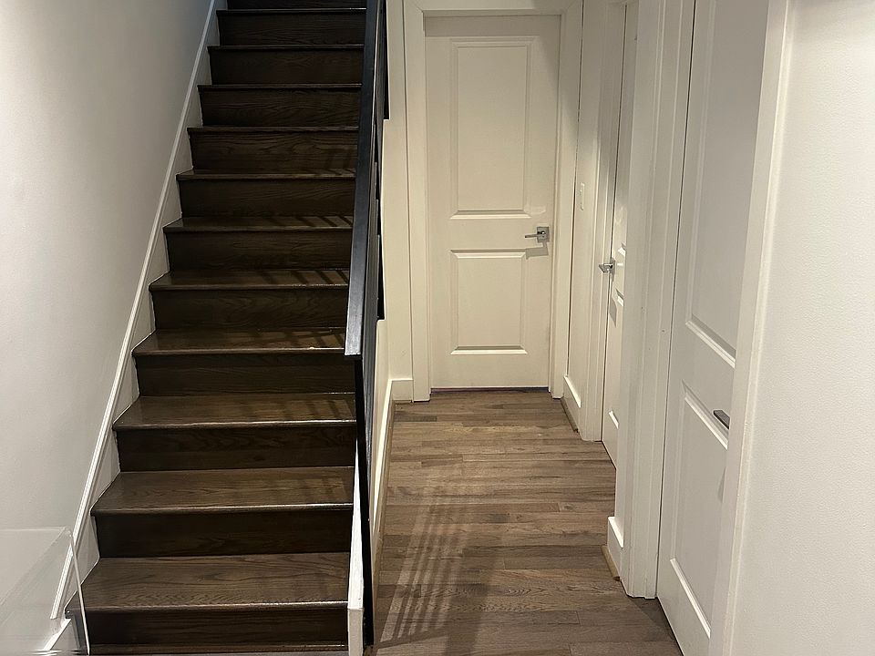 Entryway and staircase to main floor