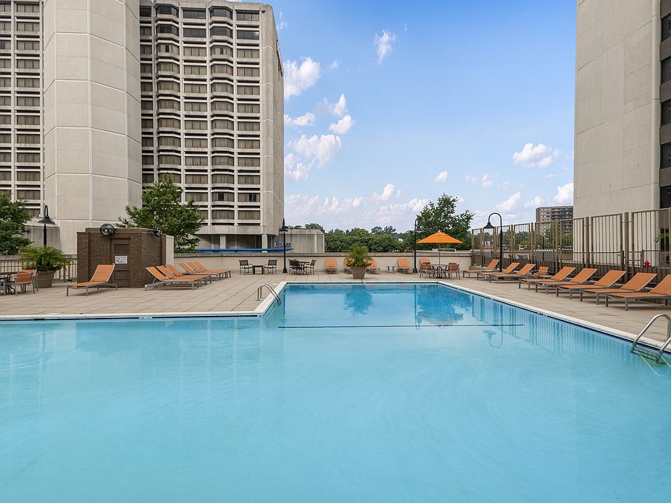 Sparkling Pool with Expansive Sundeck and Tanning Areas
