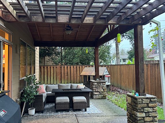 Back Patio - Pergola with covered wood area