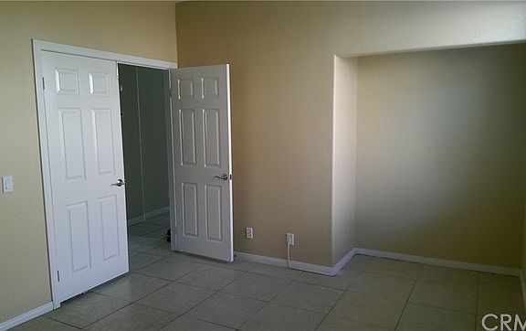 Double door entry to office or fourth bedroom. Located on lo
