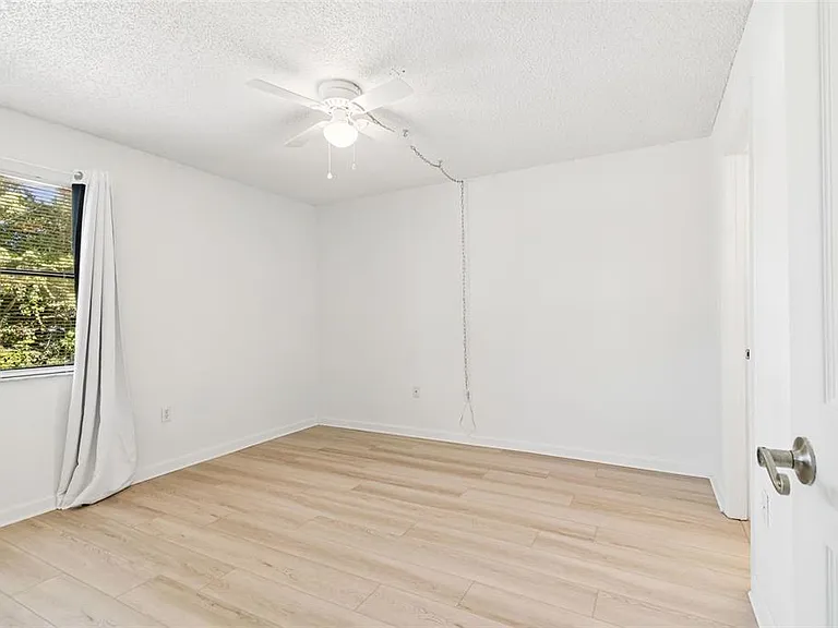 10100 Sailwinds Blvd N #202 — Photo 6