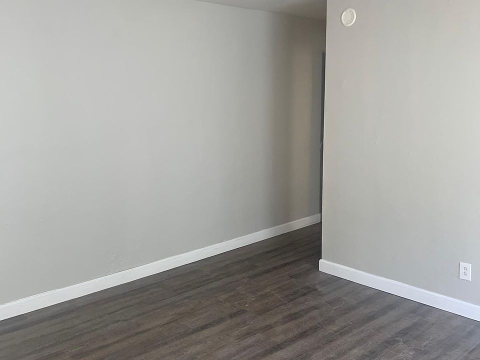 Large living/sleeping area can be subdivided for sleeping privacy. New wood laminate flooring. Fresh interior paint