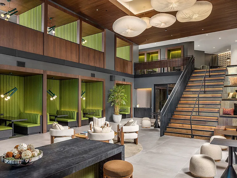 Expansive clubroom with high-end finishes and sophisticated furnishings