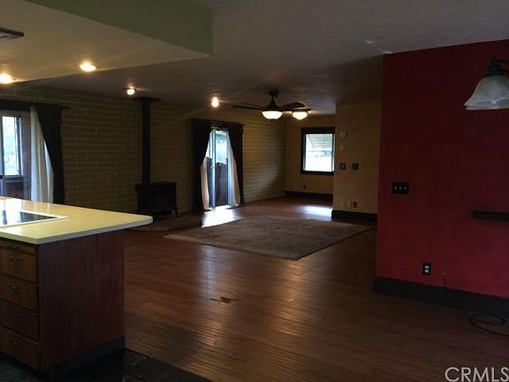 Open dining, living, kitchen and den