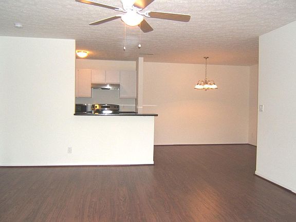 Living area has an open floor plan with bedrooms on each sid