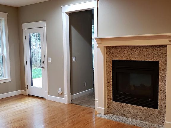 Breakfast nook with double gas fireplace