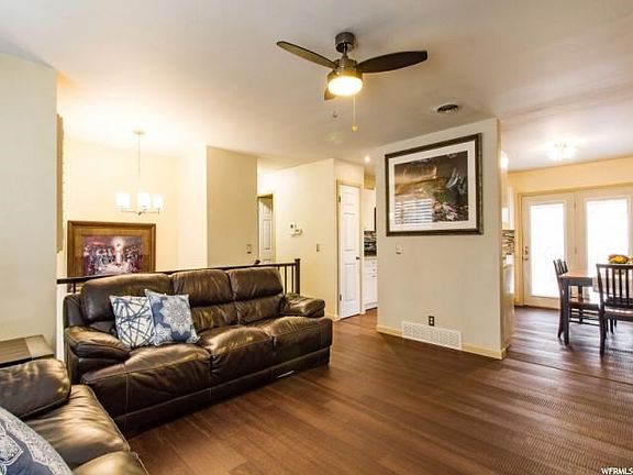 Durable hardwood flooring throughout main level