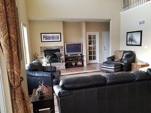 Large family room with gas fireplace.