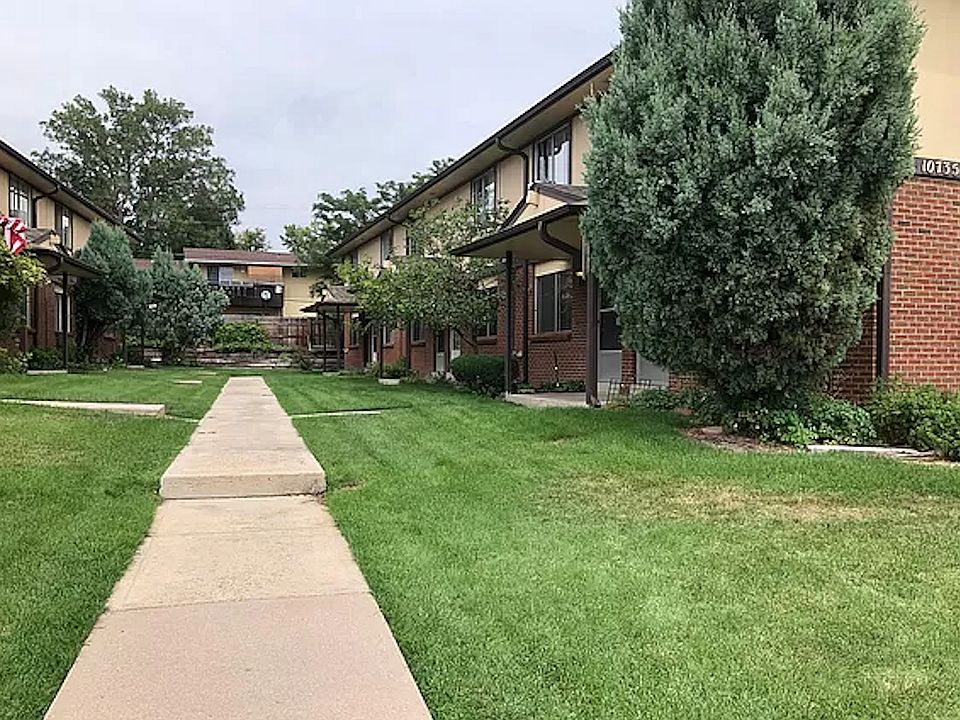 Experience serene living with this beautiful apartment courtyard, perfect for relaxation and enjoying nature.