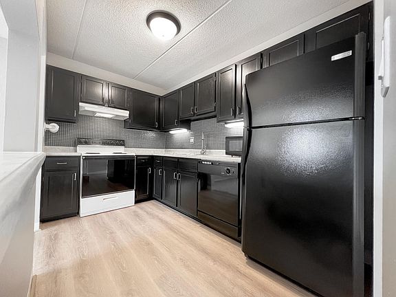 Kitchen with pass-through to the dining area