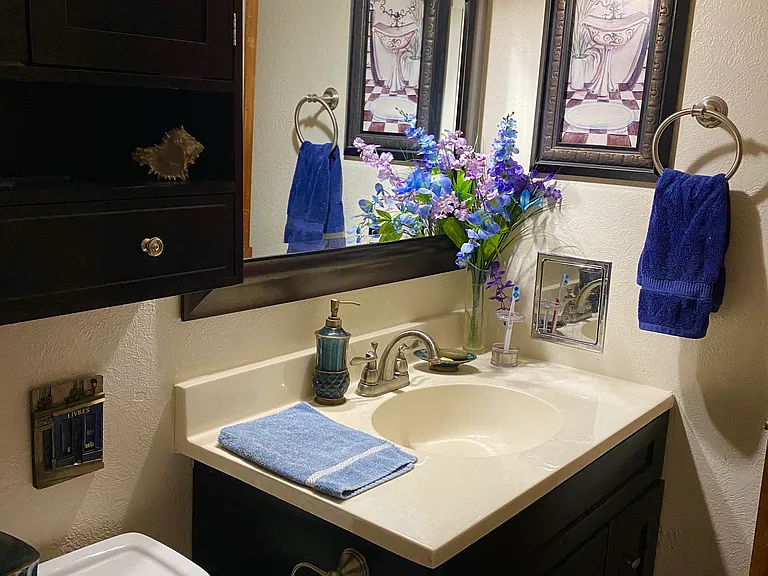 Semi private bathroom with tub sink, shower and toilet