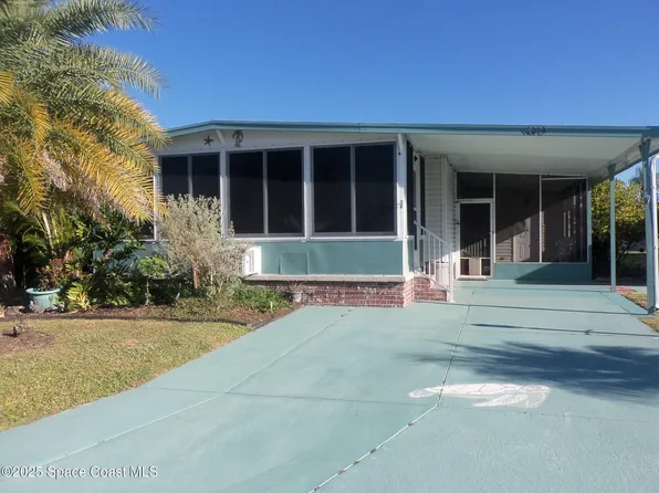 1002 Ginger Ln, Barefoot Bay, FL 32976