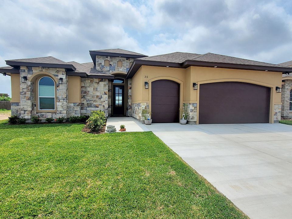 New Custom home situated in beautiful SPI golf course