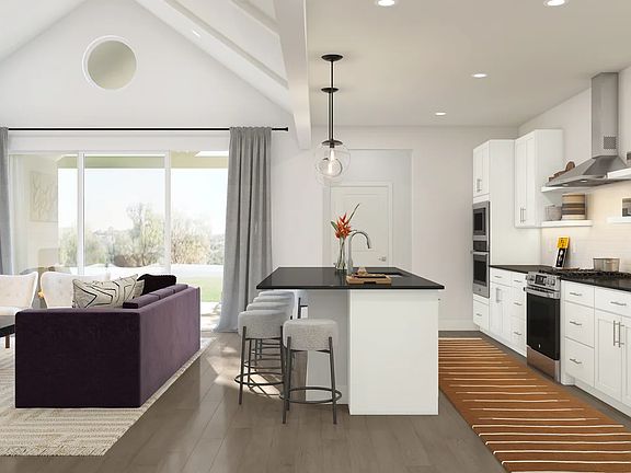 Floating shelves and waterfall island in the kitchen