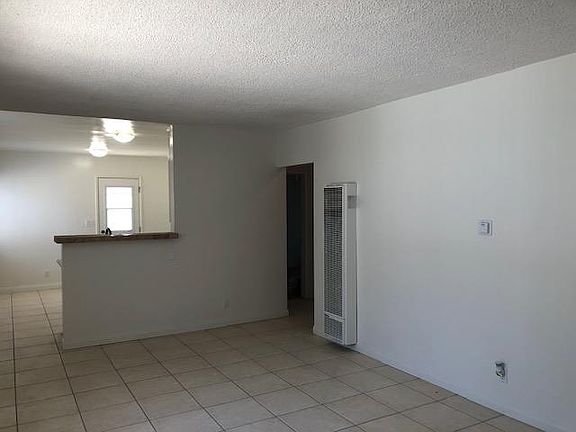 Living room opens up to kitchen