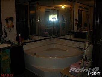 MASTER BATH HAS SEPARATE TUB AND SHOWER, ALSO HAS DOUBLE BOWL SI