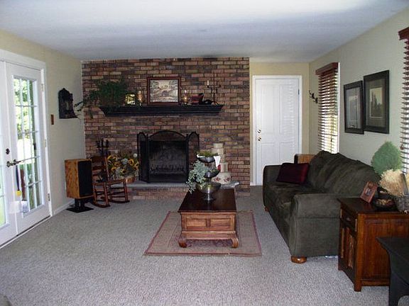 Family Room w/French Doors leading to Back Yard, Woodburning Fireplace!