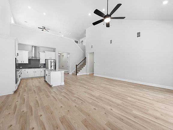 The dinning room and living room sit right off of the kitchen.