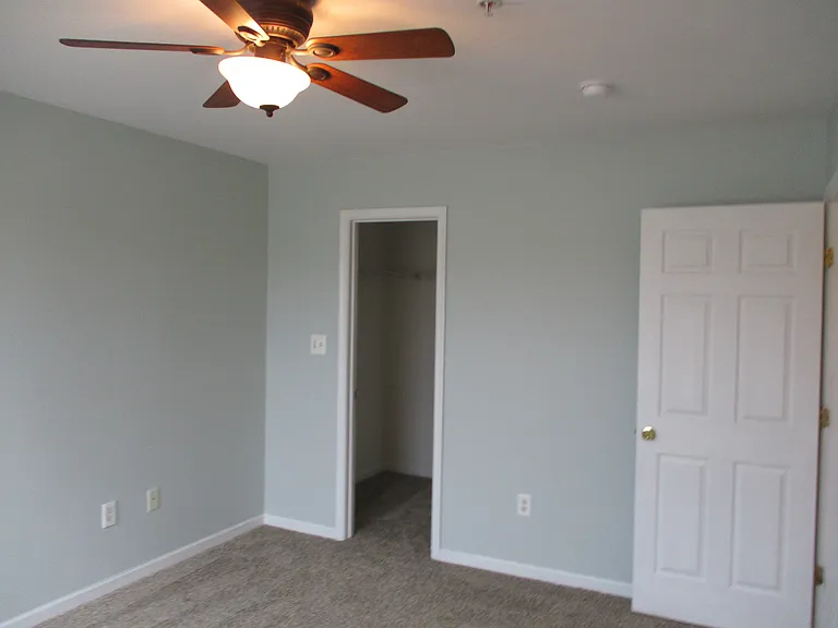 Reverse view of owner's bedroom with 2 large walk in closets