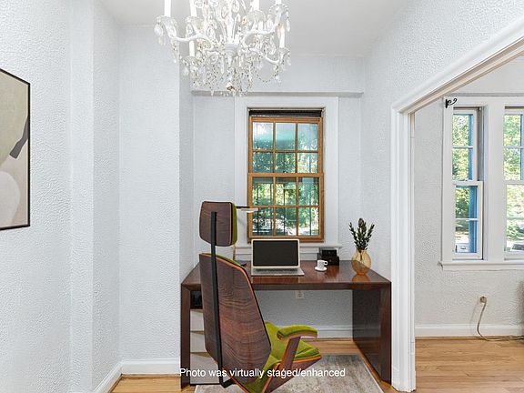 Dining room/ office area.. this photo makes it appear small. see next photo for better idea