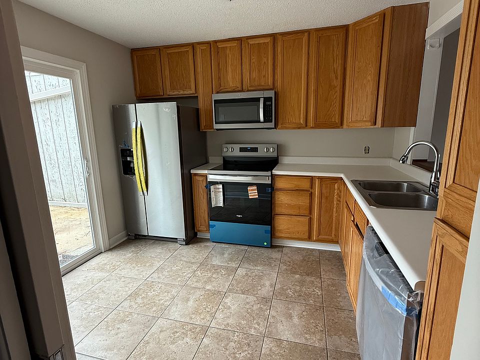 Kitchen includes all new fridge, stove, microwave and dishwasher.