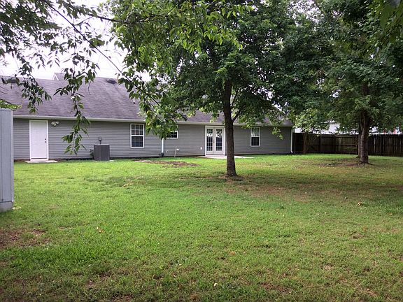 Property on half acre. Fenced in back yard.