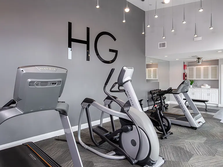 Reach your wellness goals anytime in our fully equipped 24-hour fitness center featuring cardio machines, free weights, and more.