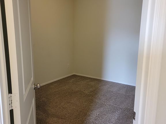 Bedroom 2 (not pictured is the ceiling fan)