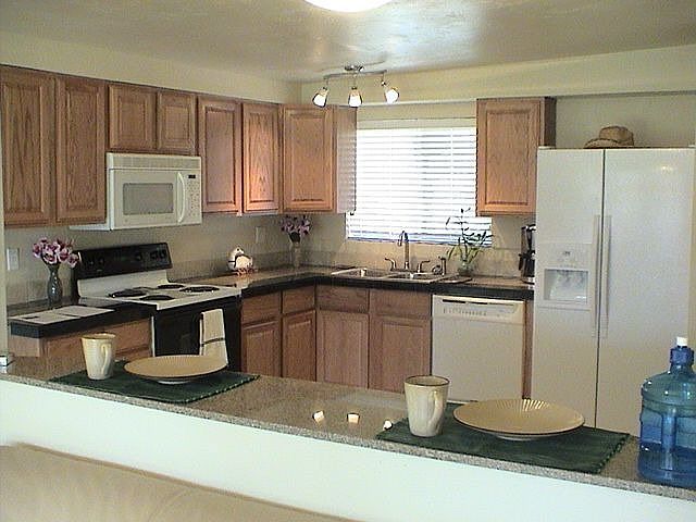 Kitchen With New cabinets/ Granite counter tops and breakfast bar