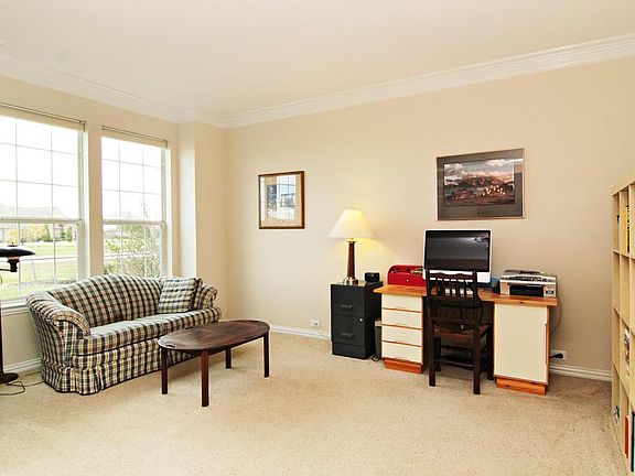 The Formal Living Room has crown molding