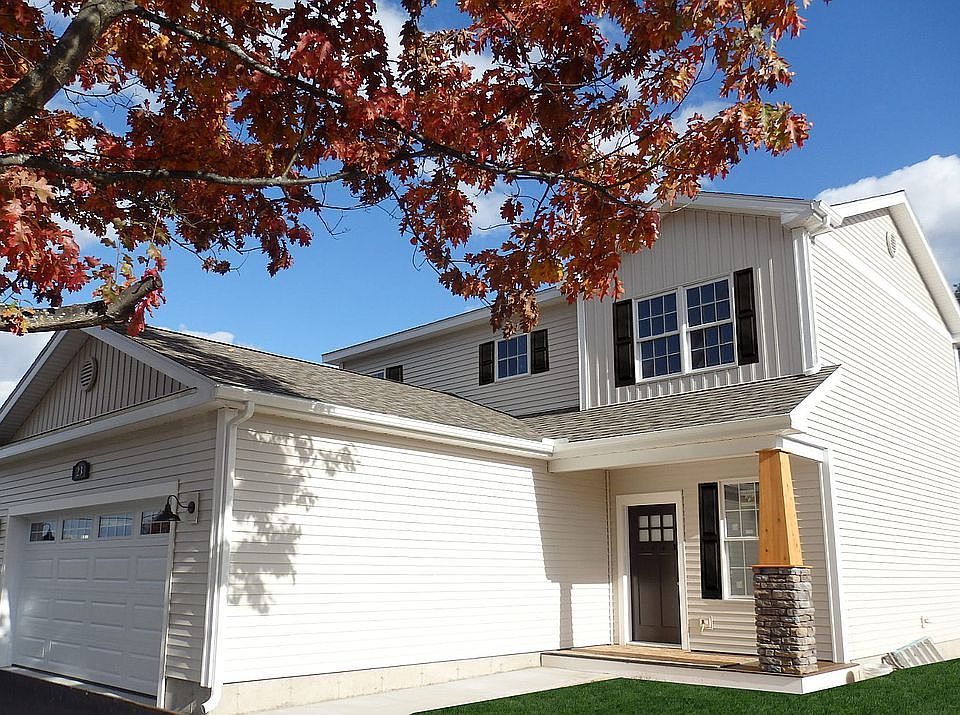 Photo is of a similar home -